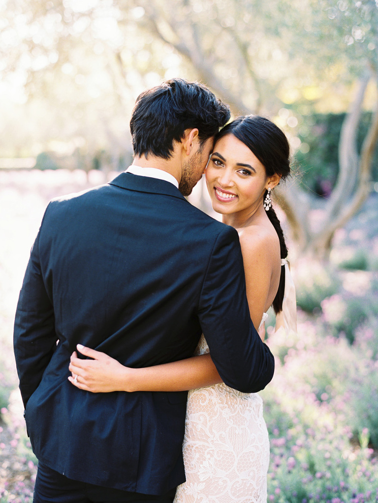 Newlyweds in the lavender fields at San Ysidro Ranch is Montecito 