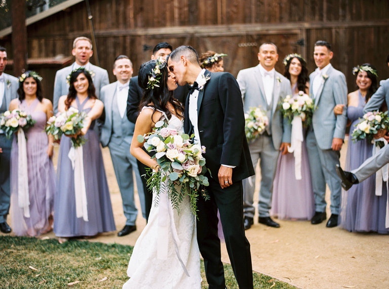 Bride and Groom celebrate with their bridal party