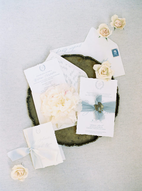 Wedding invitation suite with white flowers